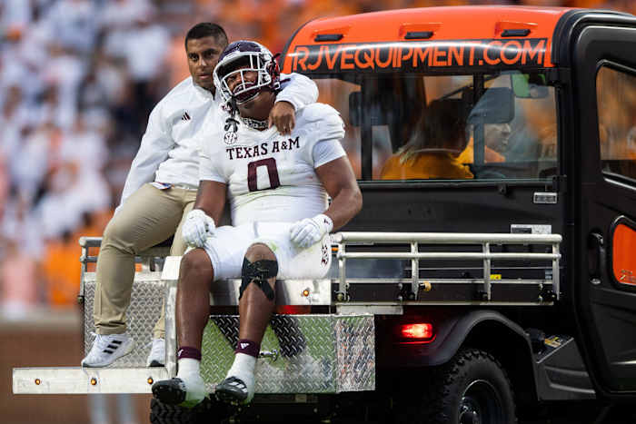 Texas A&M defensive lineman Walter Nolen is carted off the field against the Tennessee Volunteers.